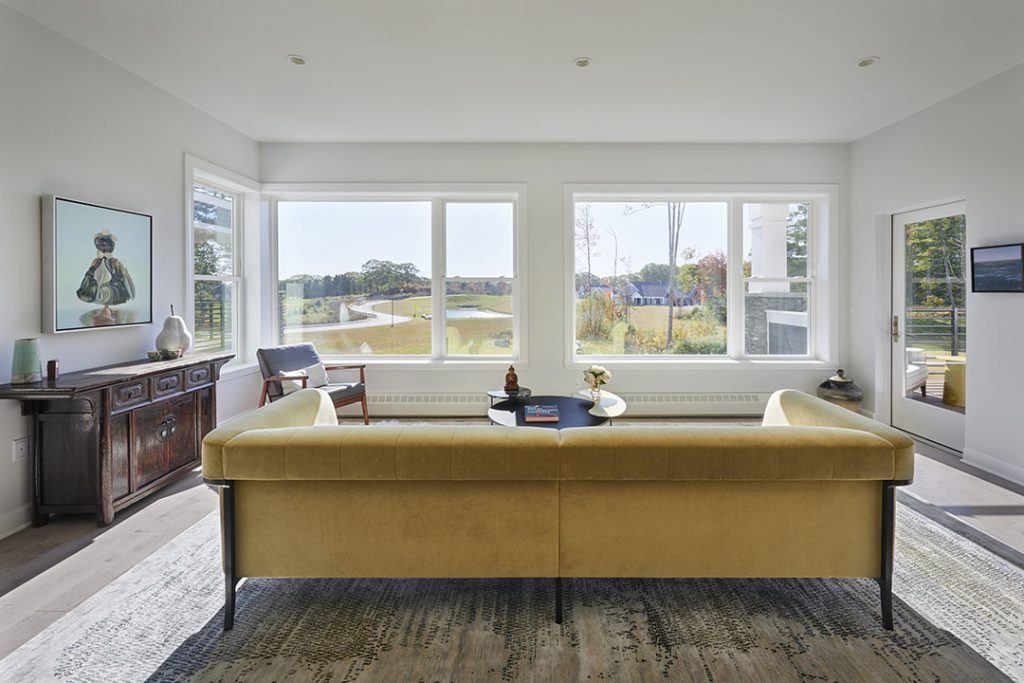 Within each of the buildings, large storefront and corner windows are employed to feature breathtaking views of these natural surroundings through all four seasons.